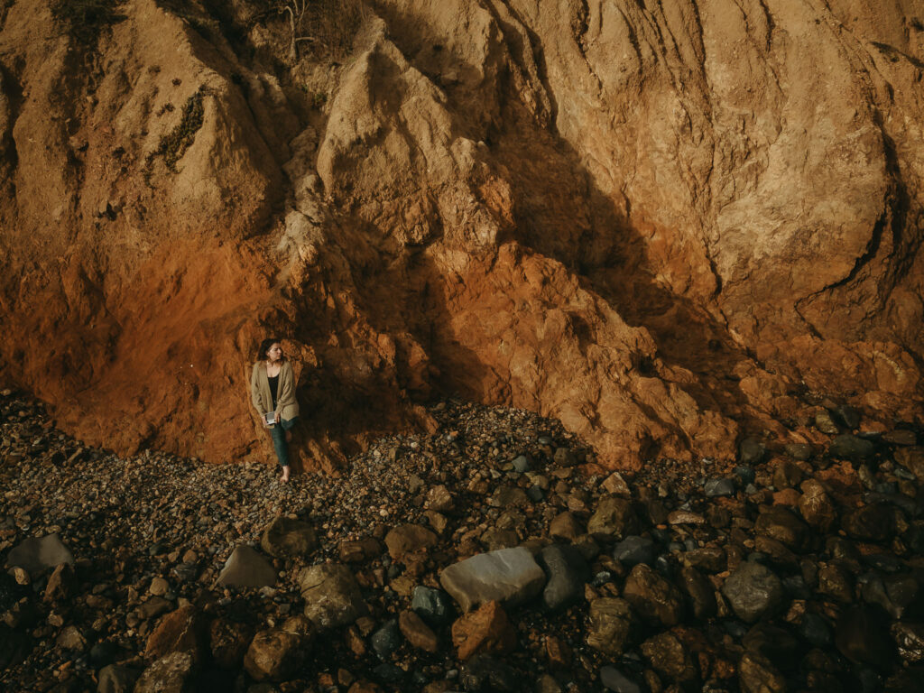 Drone self portrait of Ashley Kaplan Photography in a natural california beach area